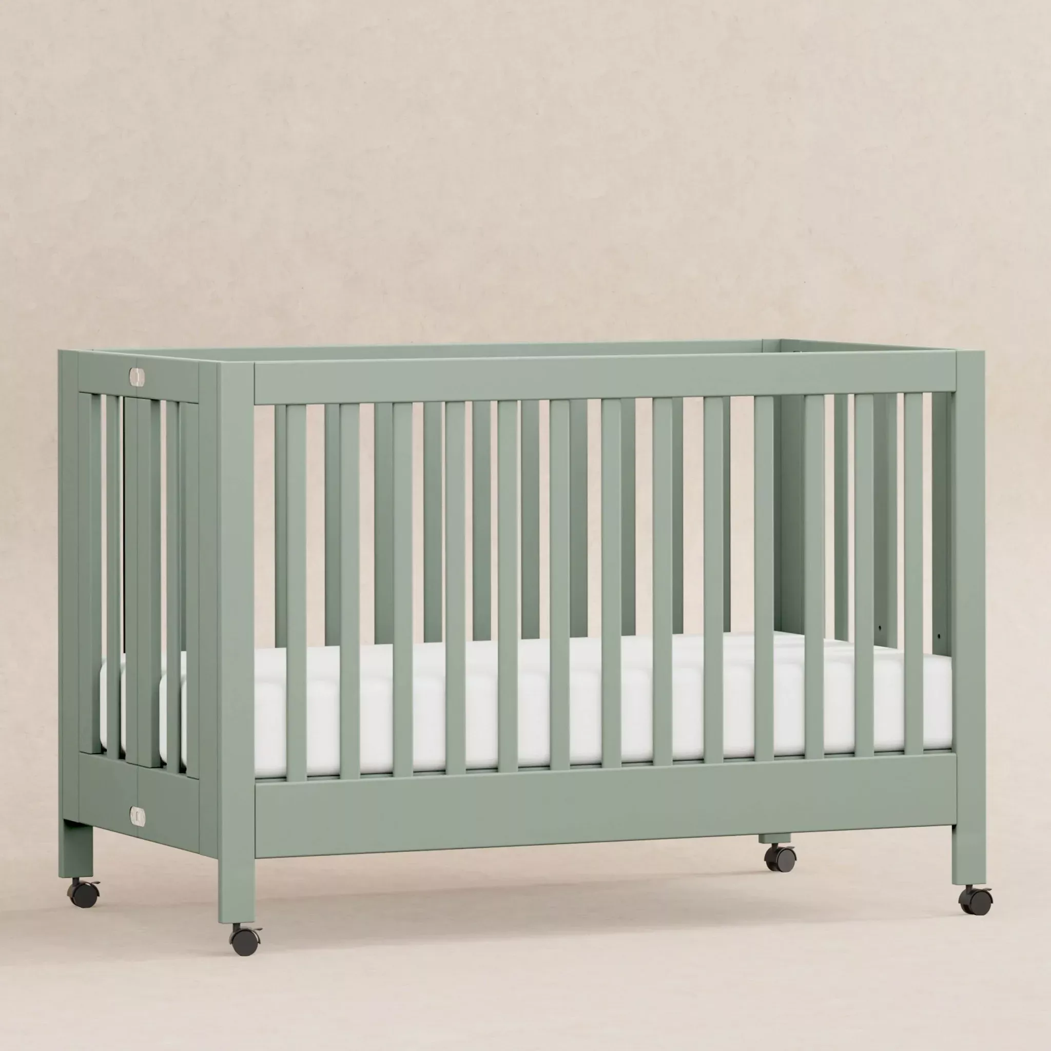 babyletto-maki-full-size-folding-crib-with-toddler-rail-light-sage-rebel Babyletto Maki Full-Size Folding Crib with Toddler Rail - Light Sage – REBEL