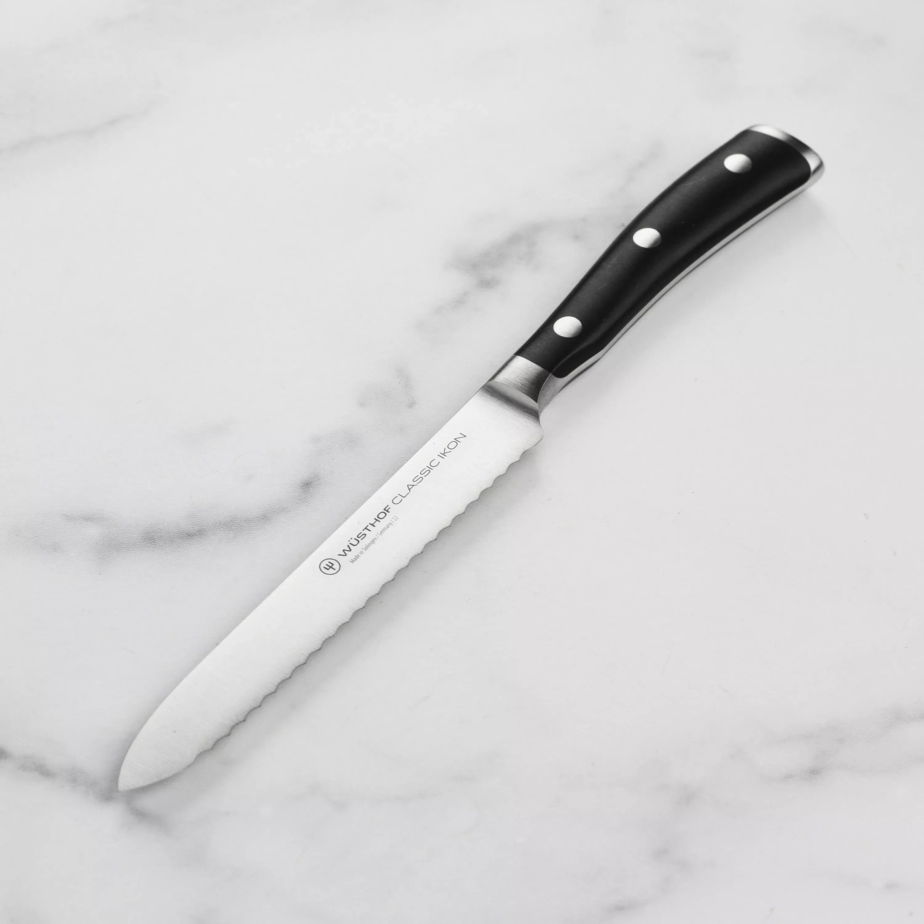 wusthof-classic-ikon-serrated-utility-knife-5 Wusthof Classic Ikon Serrated Utility Knife - 5"