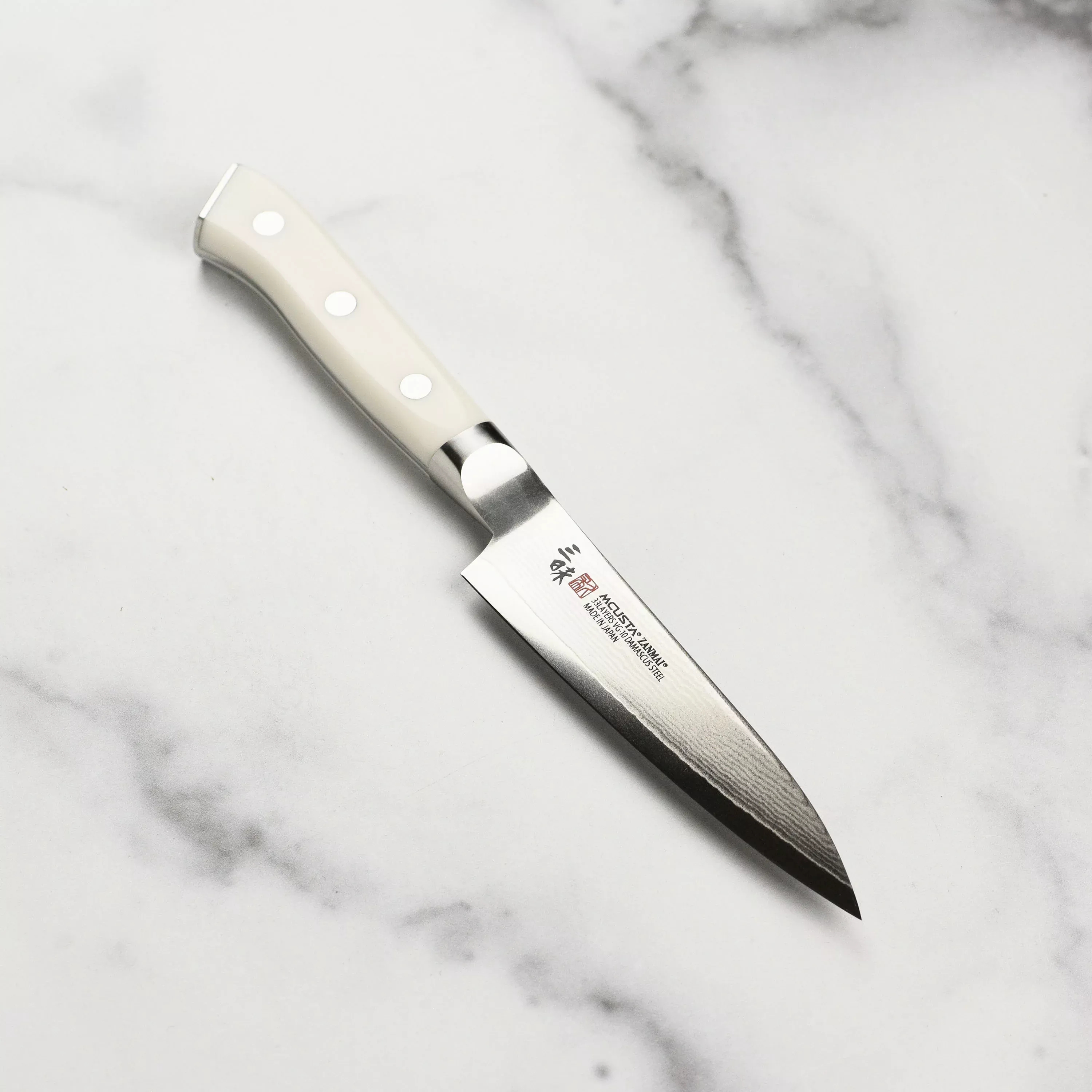 zanmai-classic-damascus-corian-4-3-petty Zanmai Classic Damascus Corian 4.3" Petty