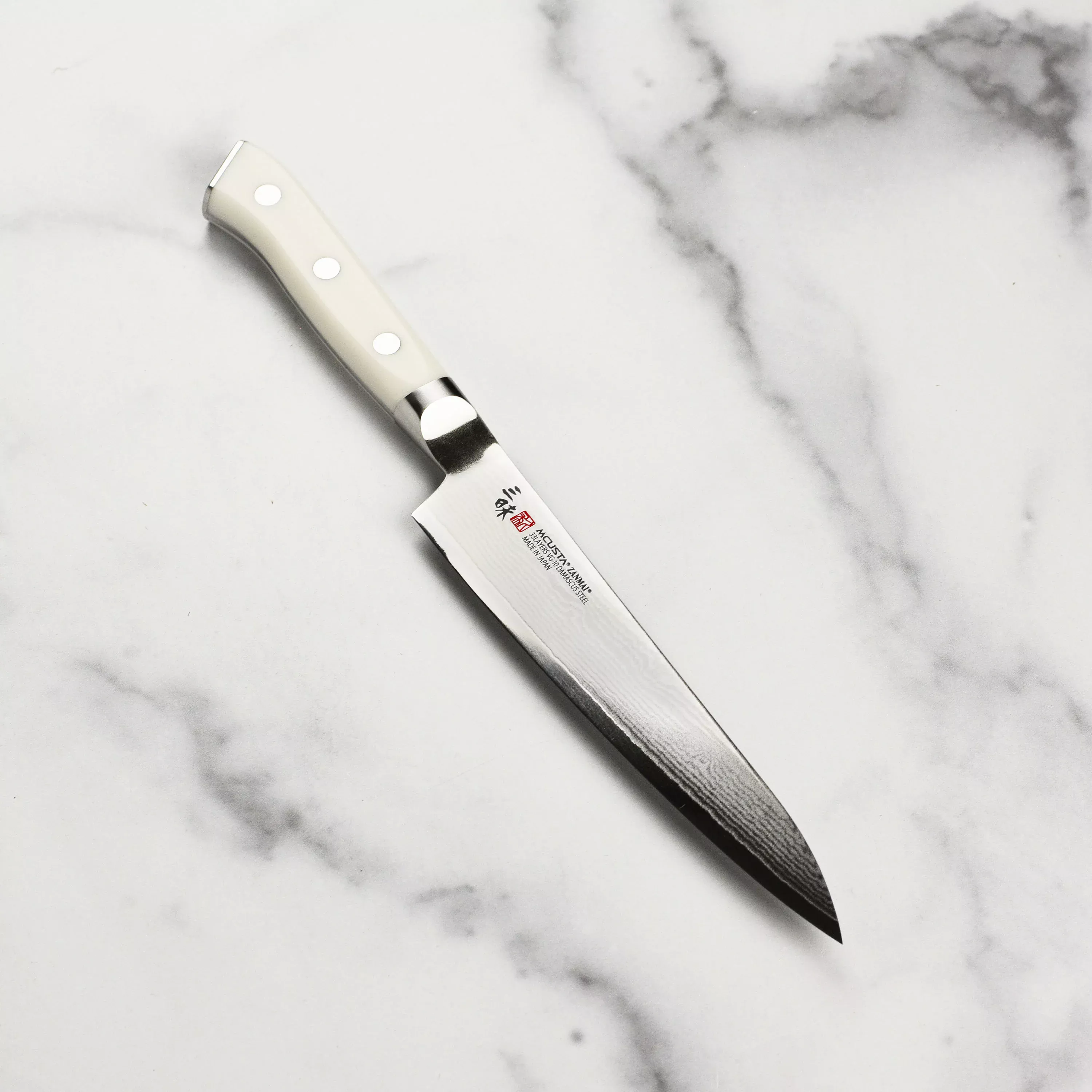 zanmai-classic-damascus-corian-5-9-petty Zanmai Classic Damascus Corian 5.9" Petty