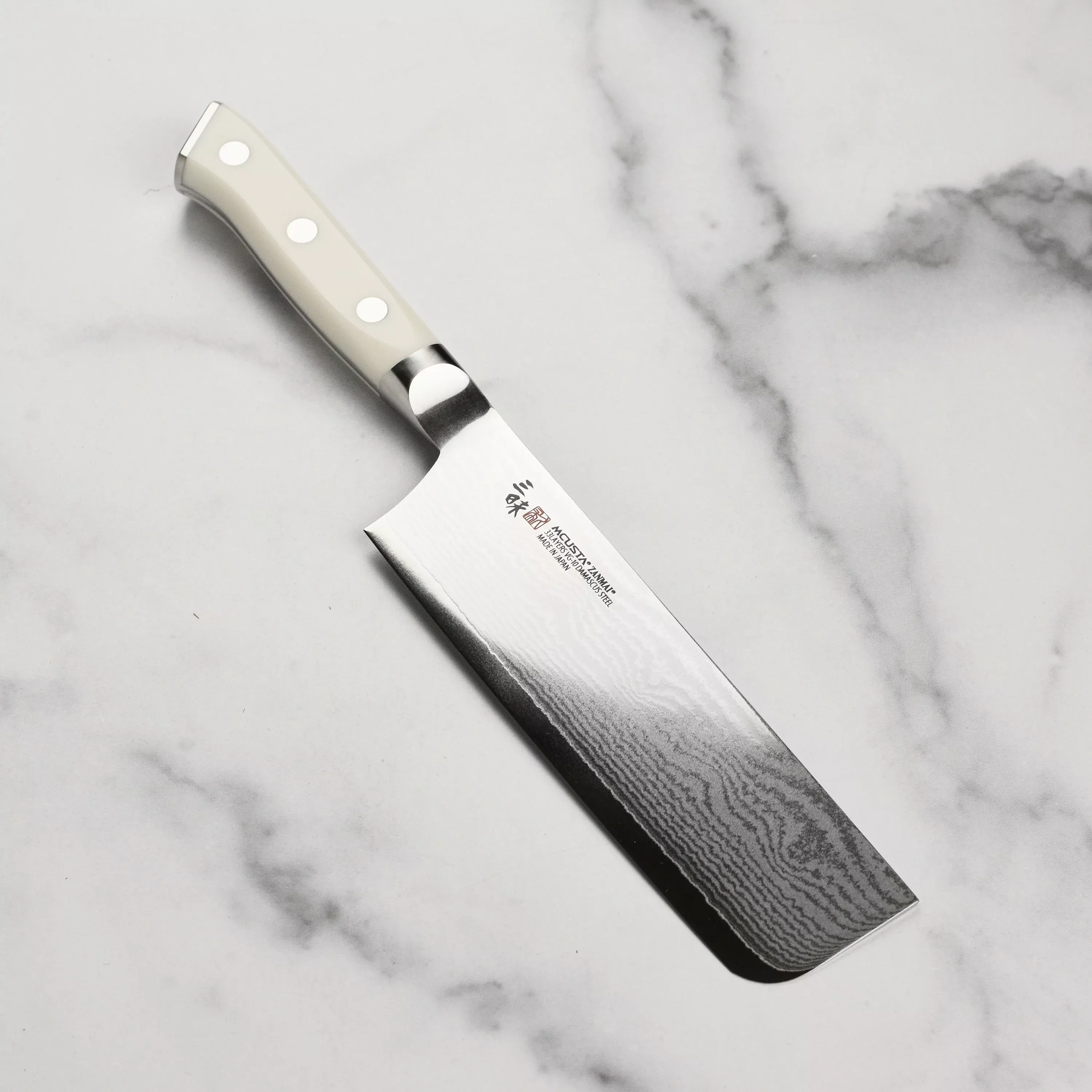 zanmai-classic-damascus-corian-6-5-nakiri Zanmai Classic Damascus Corian 6.5" Nakiri