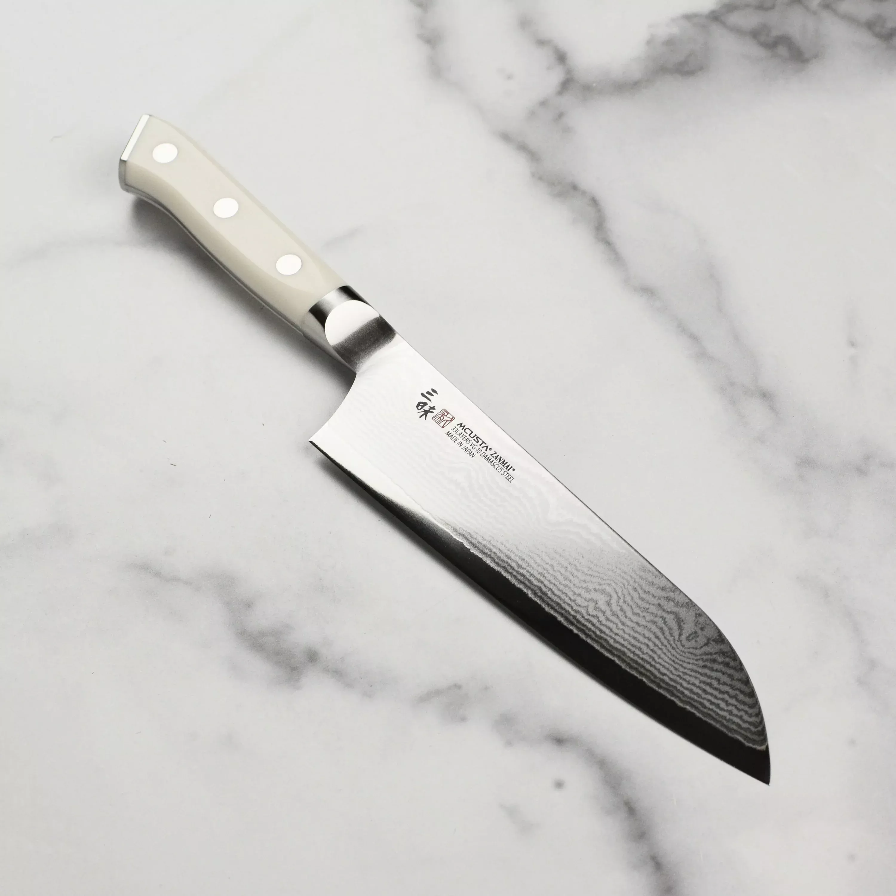 zanmai-classic-damascus-corian-7-santoku Zanmai Classic Damascus Corian 7" Santoku