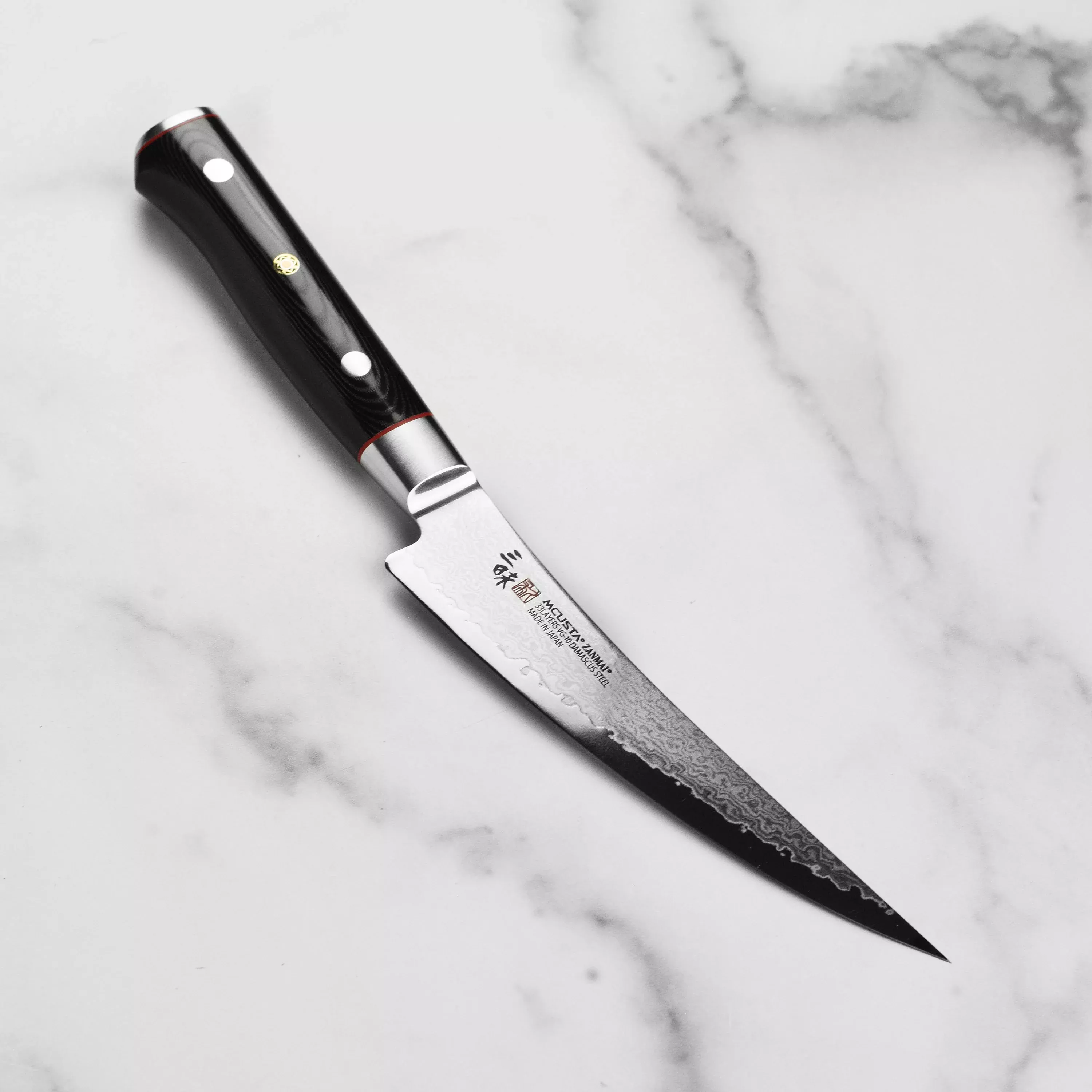 zanmai-classic-pro-zebra-damascus-6-5-curved-boning-knife Zanmai Classic Pro Zebra Damascus 6.5" Curved Boning Knife