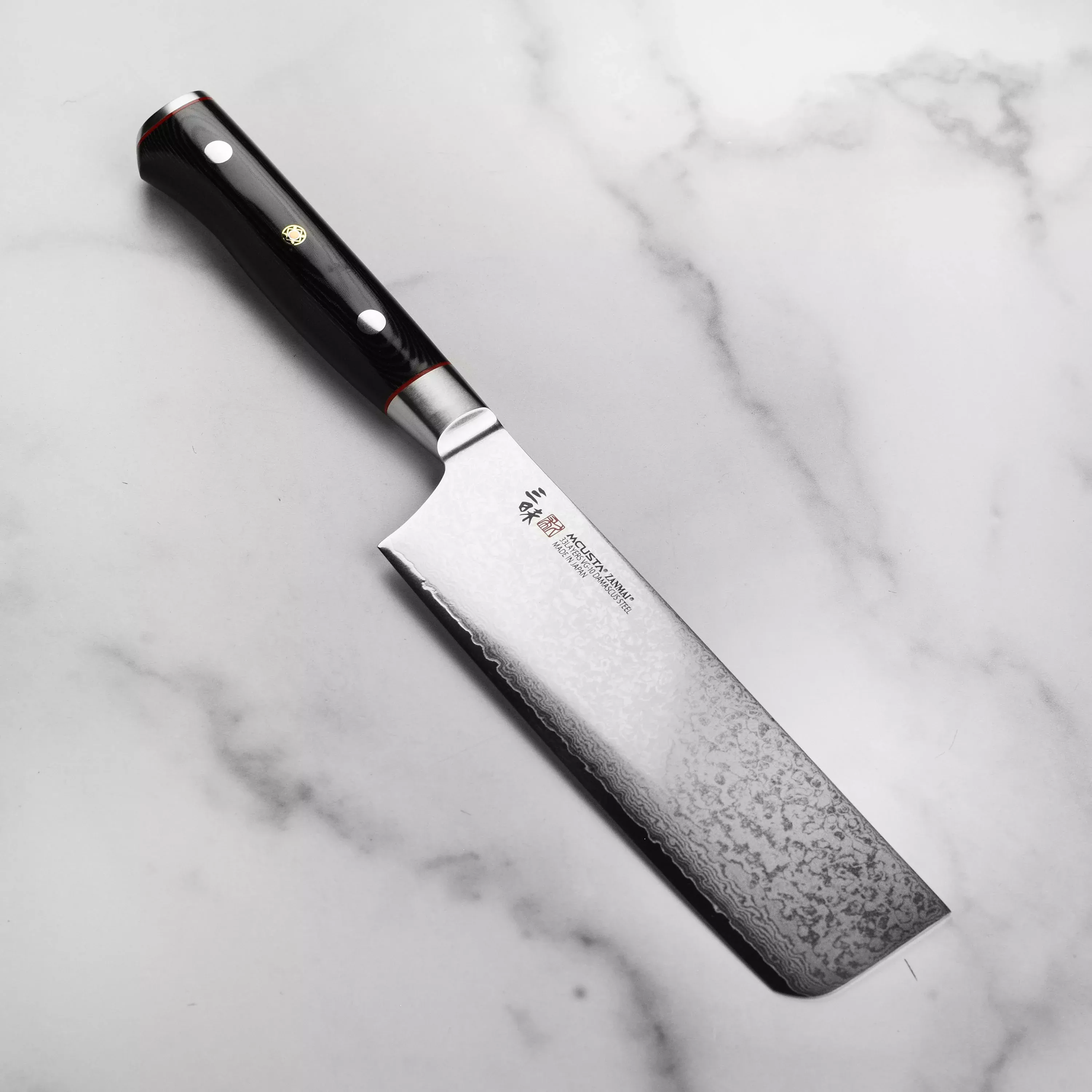 zanmai-classic-pro-zebra-damascus-6-5-nakiri Zanmai Classic Pro Zebra Damascus 6.5" Nakiri