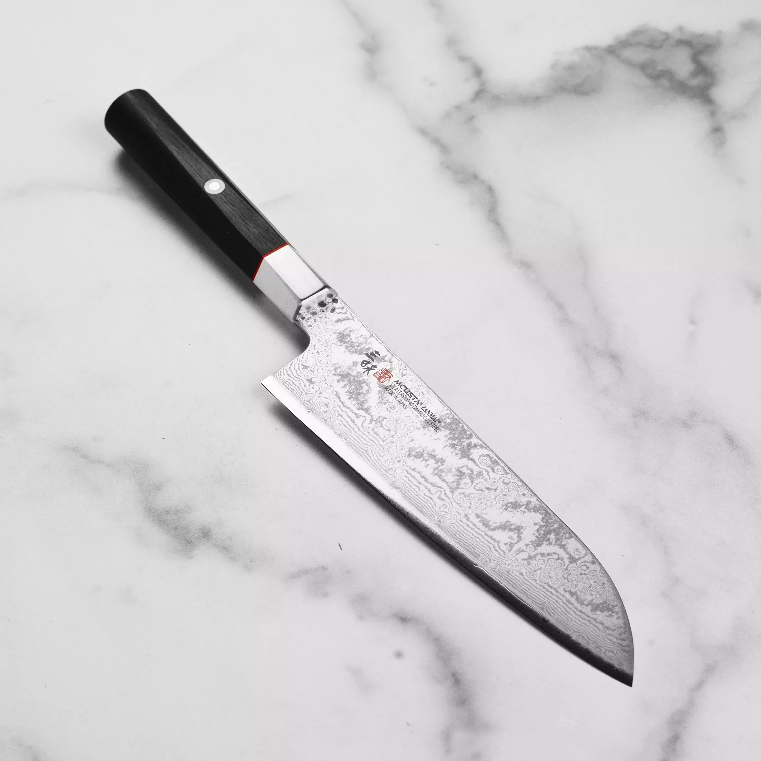 zanmai-hybrid-damascus-splash-7-santoku-knife Zanmai Hybrid Damascus Splash 7" Santoku Knife