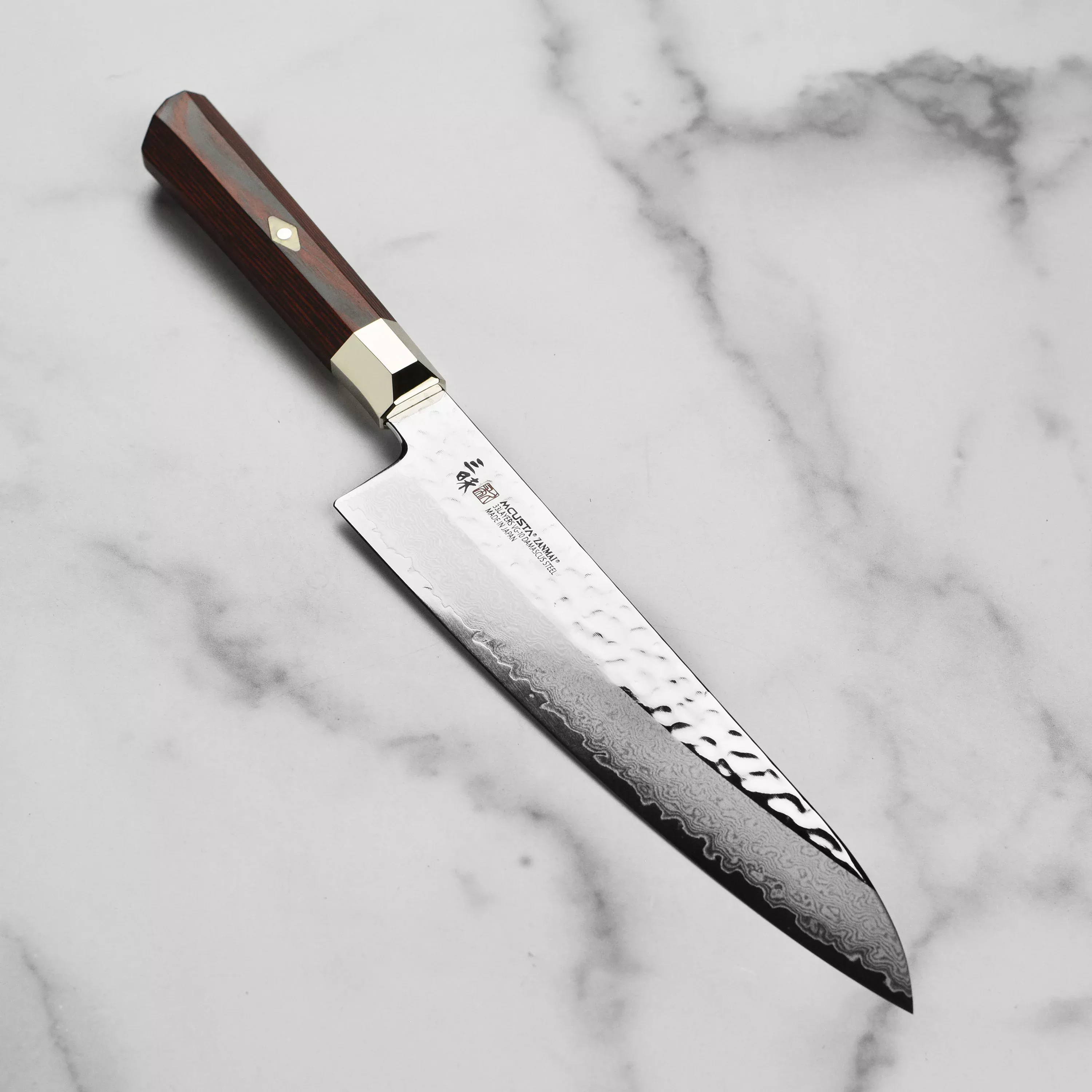 zanmai-supreme-hammered-8-25-gyuto Zanmai Supreme Hammered 8.25" Gyuto