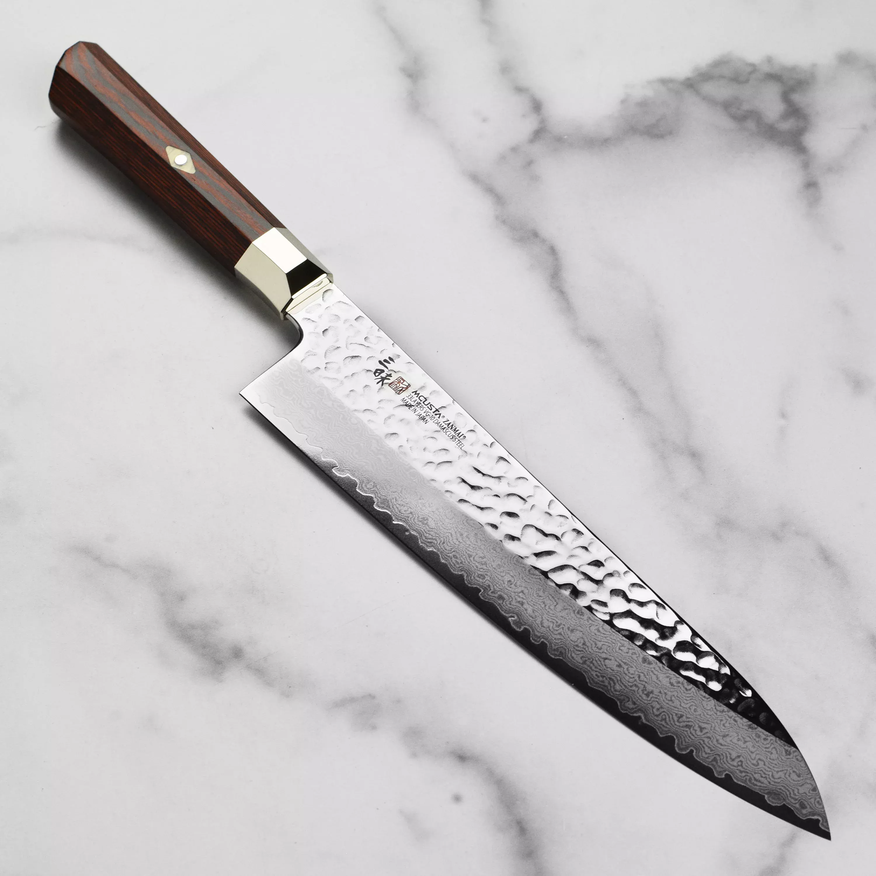 zanmai-supreme-hammered-9-4-gyuto Zanmai Supreme Hammered 9.4" Gyuto
