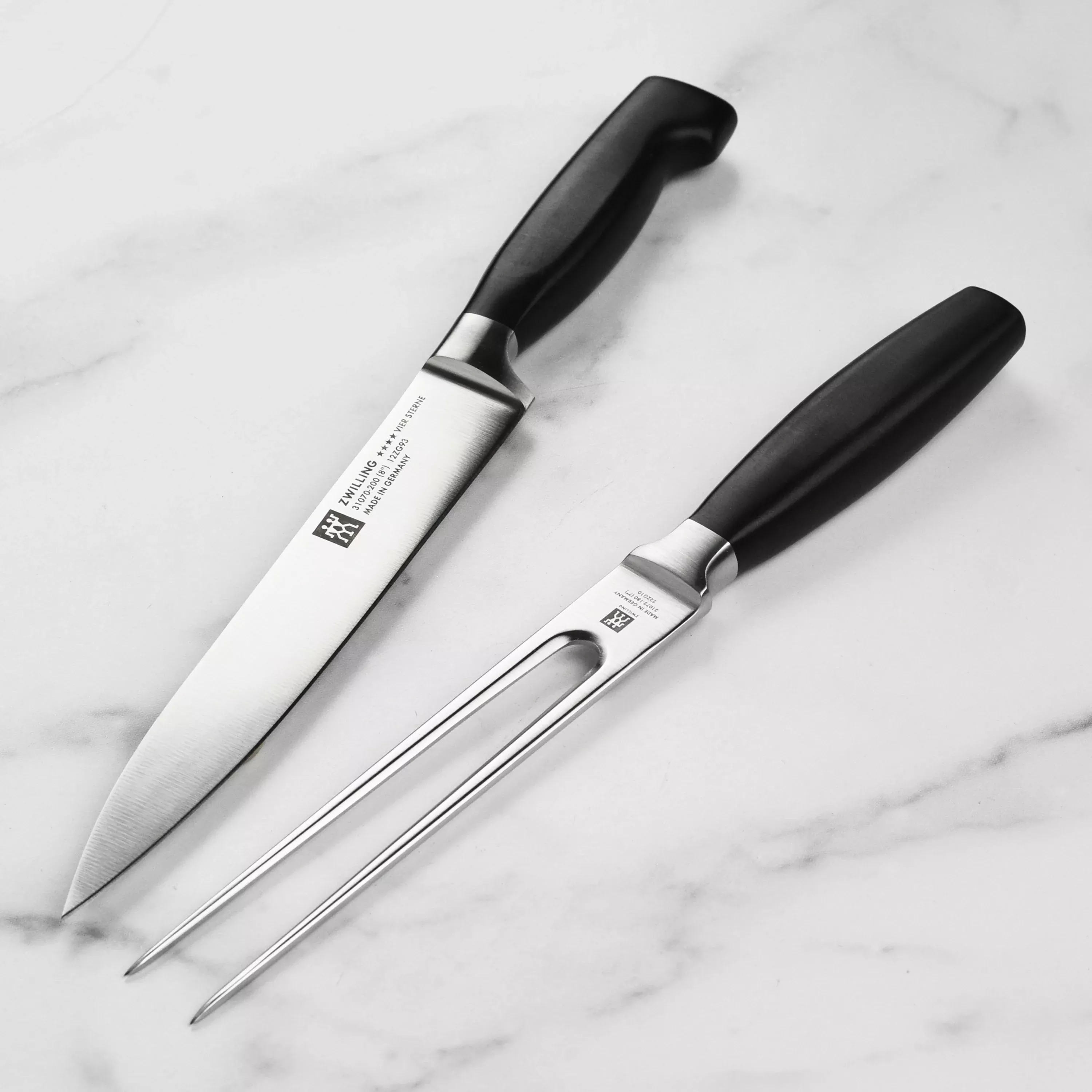 zwilling-j-henckels-four-star-carving-knife-fork-set Zwilling J.A. Henckels Four Star Carving Knife & Fork Set
