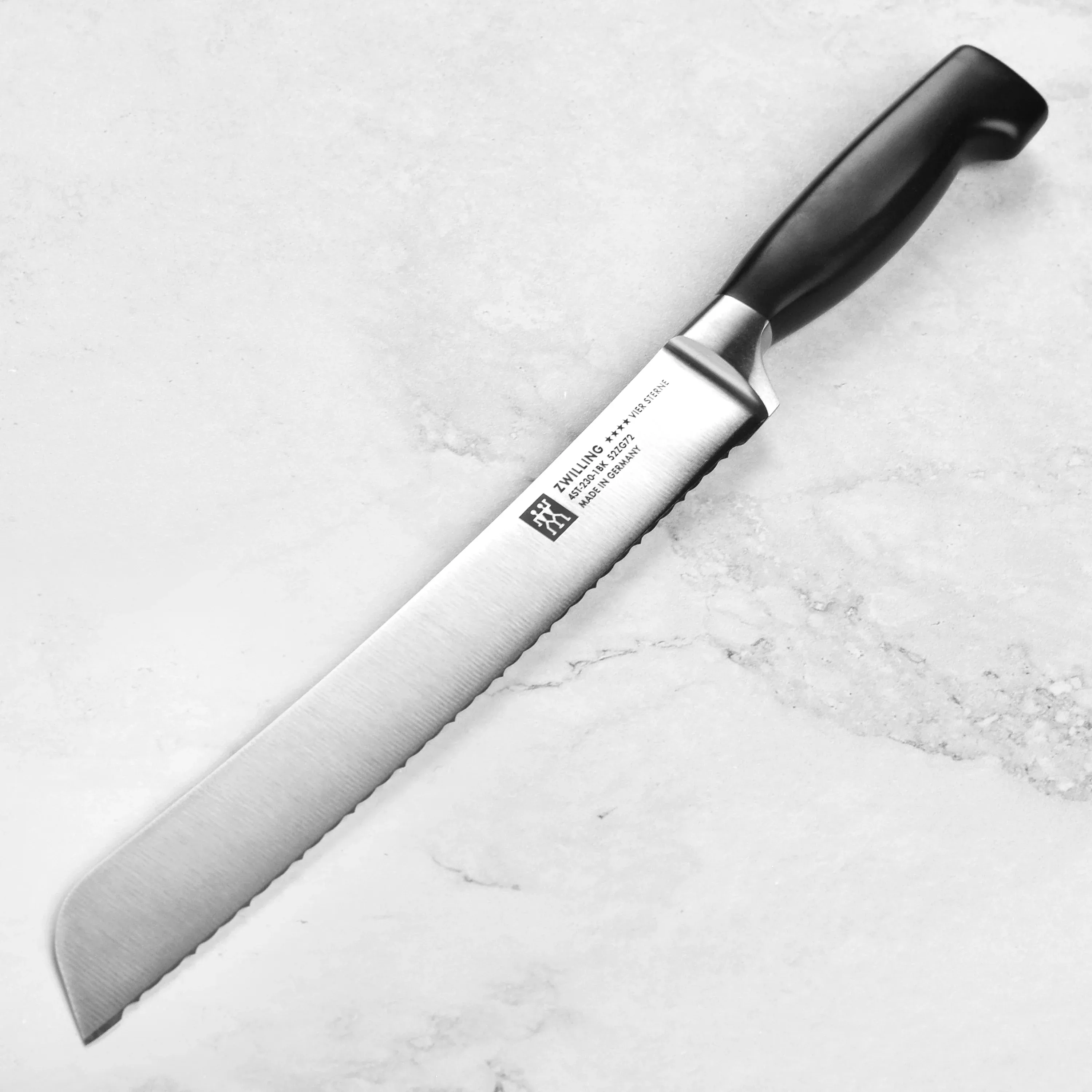 zwilling-j-henckels-four-star-country-bread-knife-9 Zwilling J.A. Henckels Four Star Country Bread Knife - 9"