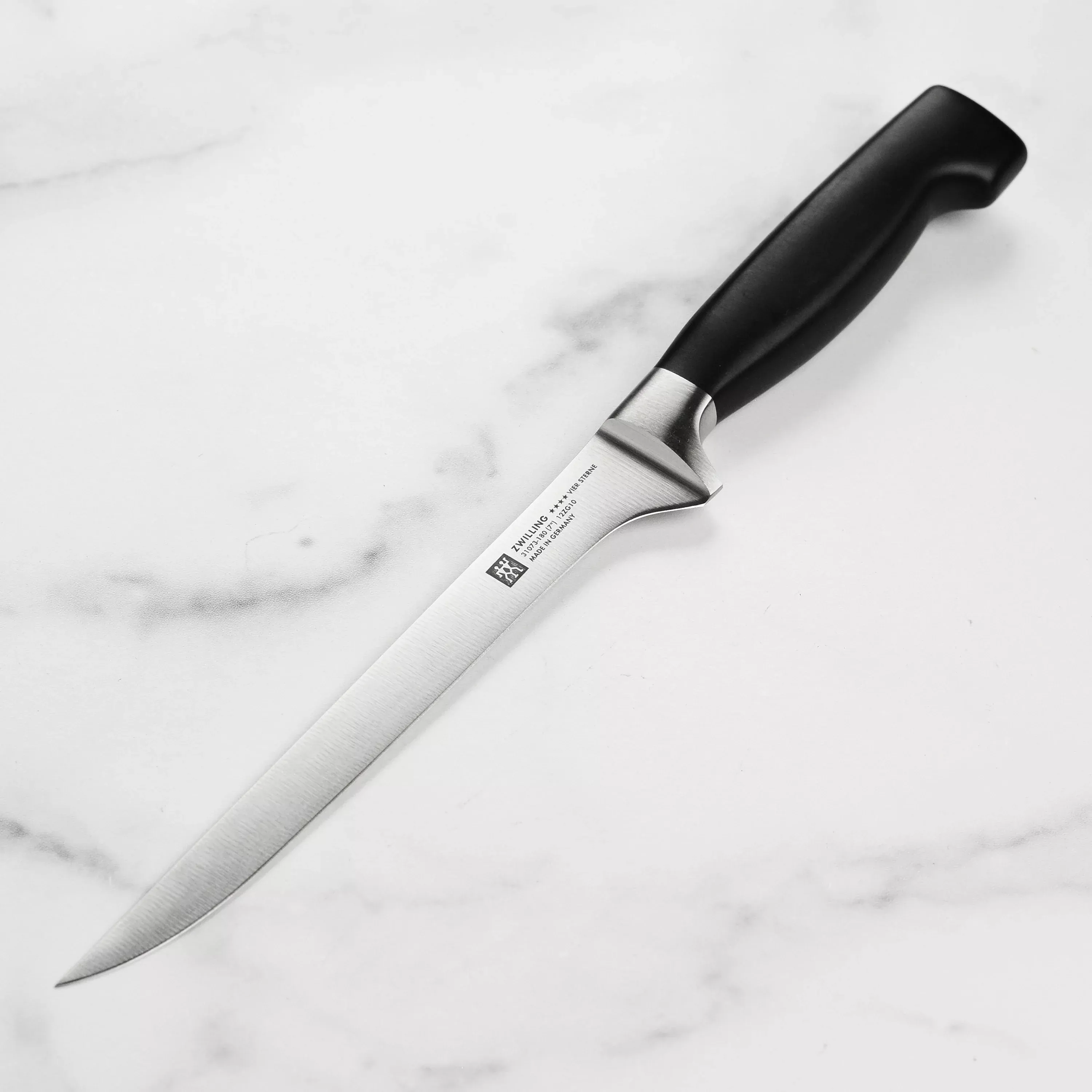 zwilling-j-henckels-four-star-flexible-fillet-knife-7 Zwilling J.A. Henckels Four Star Flexible Fillet Knife - 7"