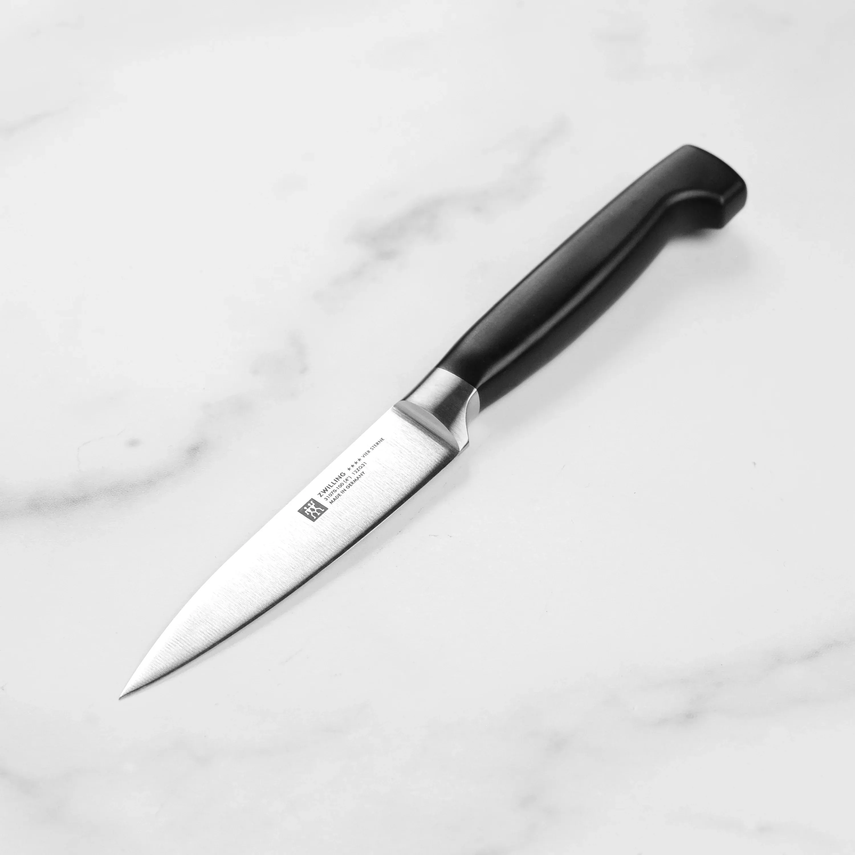 zwilling-j-henckels-four-star-paring-knife-4 Zwilling J.A. Henckels Four Star Paring Knife - 4"