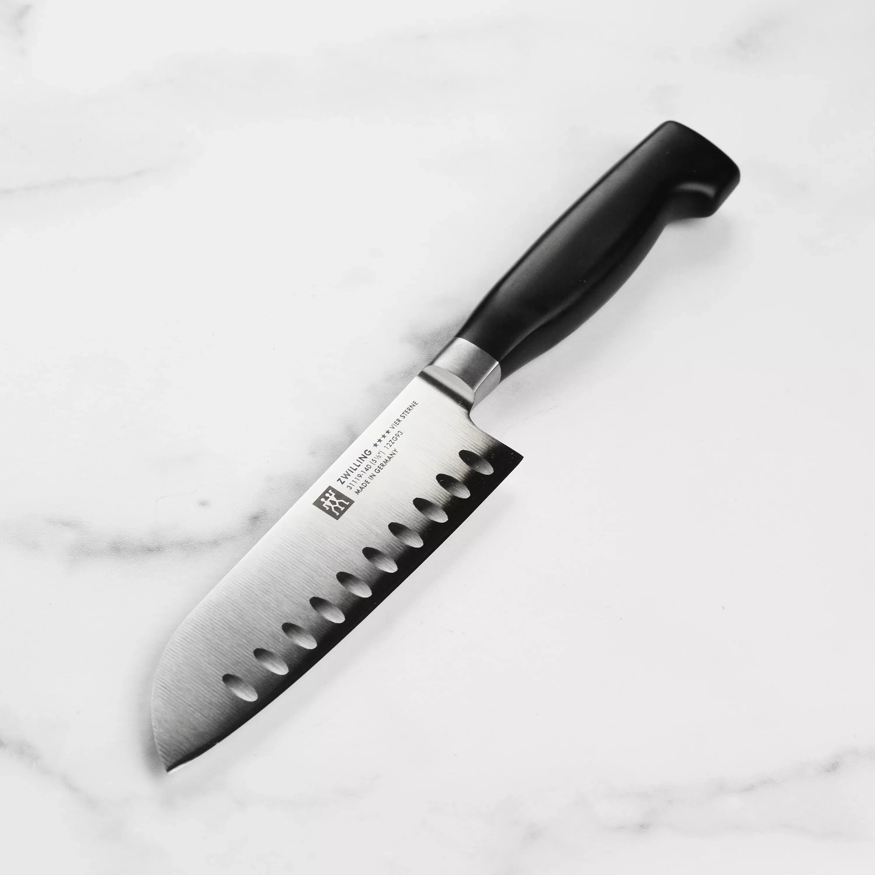 zwilling-j-henckels-four-star-santoku-knife-5-5-hollow-edge Zwilling J.A. Henckels Four Star Santoku Knife - 5.5" Hollow Edge