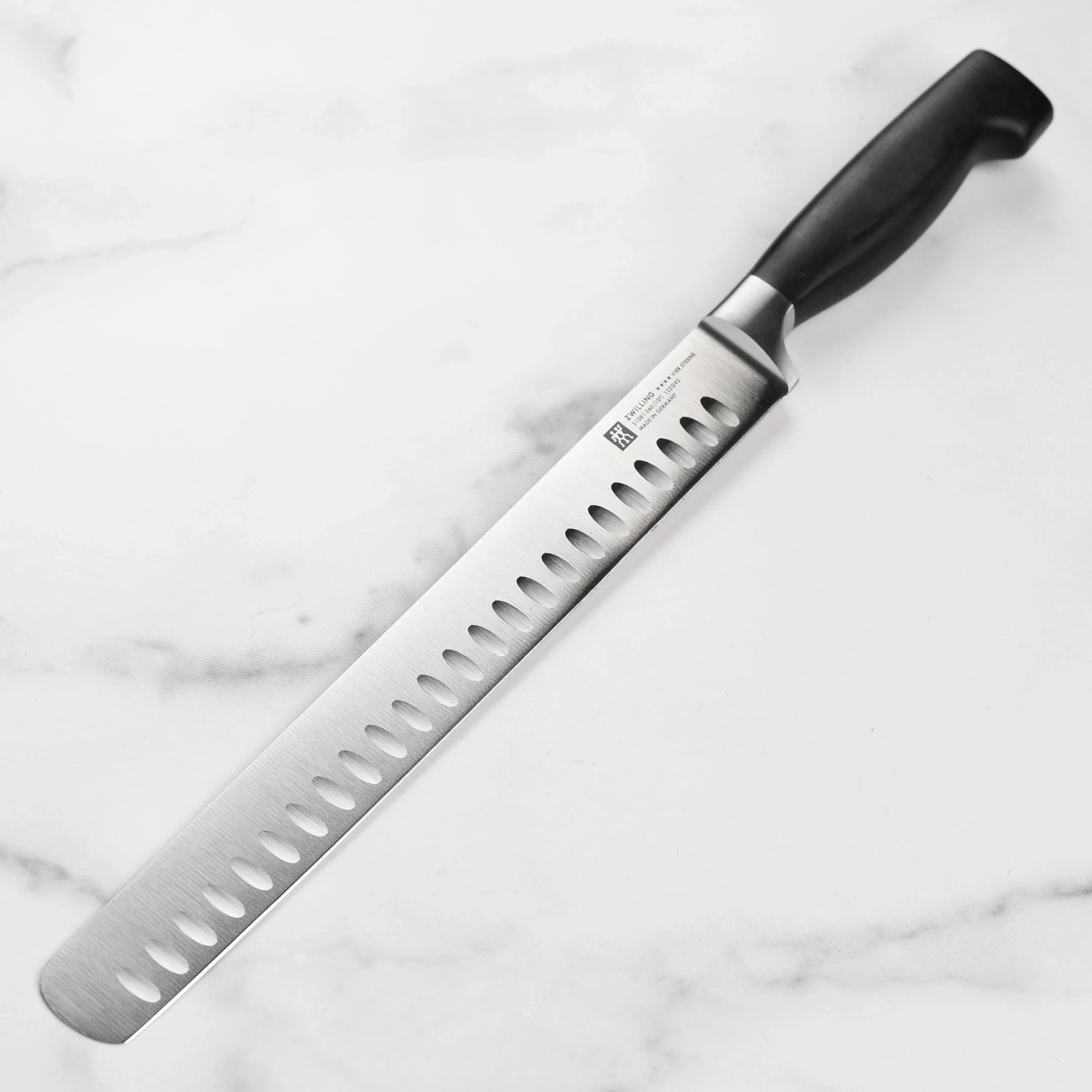 zwilling-j-henckels-four-star-slicing-knife-10-hollow-edge Zwilling J.A. Henckels Four Star Slicing Knife - 10" Hollow Edge