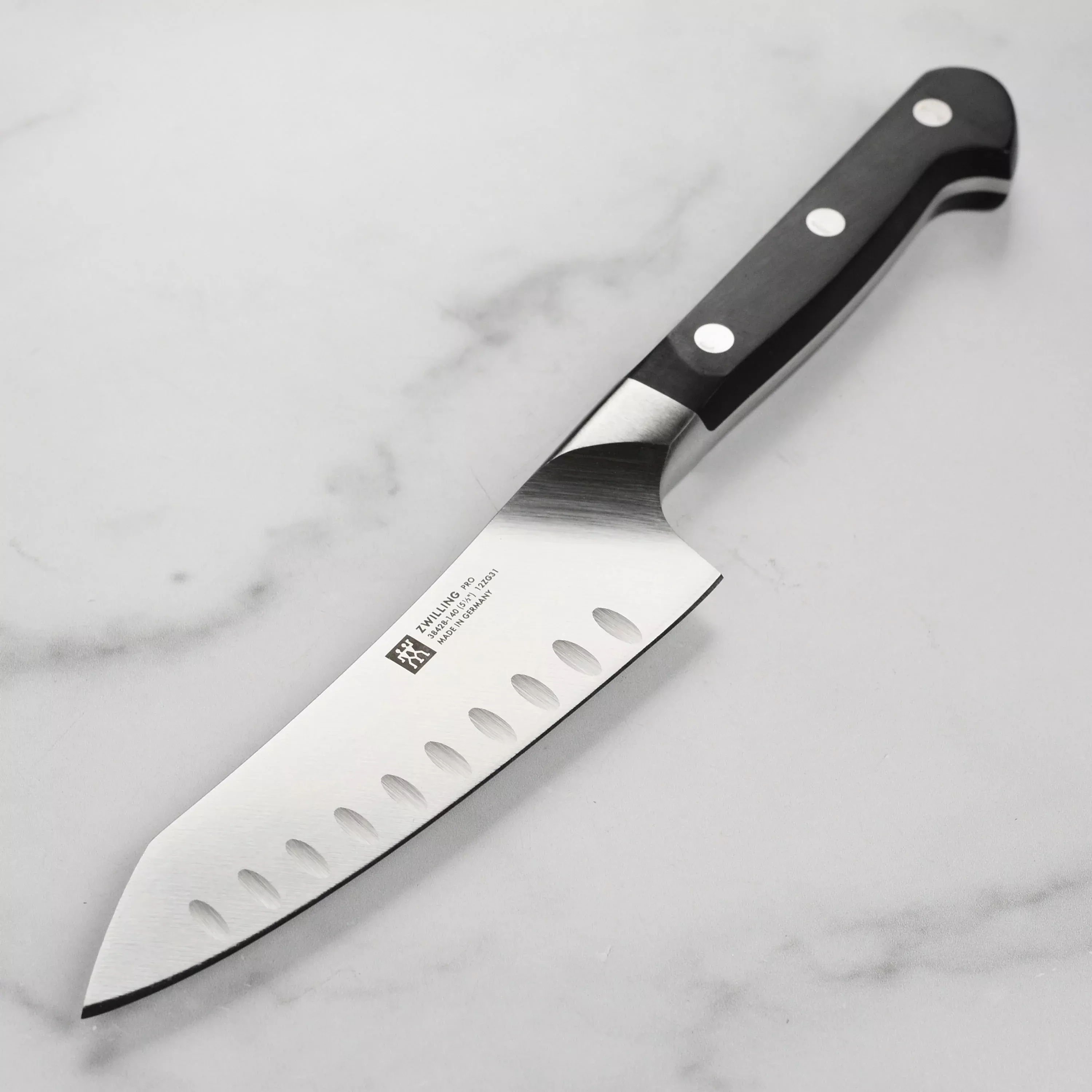 zwilling-pro-rocking-santoku-knife-5-5-hollow-edge Zwilling Pro Rocking Santoku Knife - 5.5" Hollow Edge
